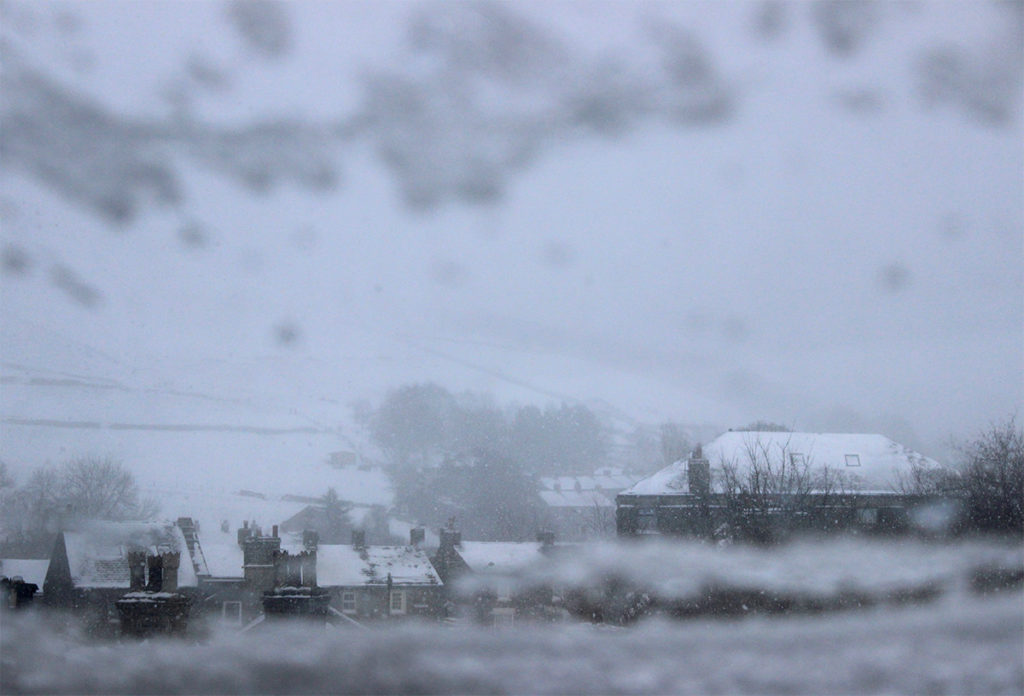 Hayfield Snow from Window - Photo of heavy snow across Hayfield Village in the Peak District - photo by gavstretchy