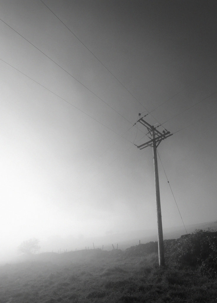 Misty Phoside Pylon - Photo of an electricity pylons in the mist on Phoside in Hayfield, Peak District - photo by gavstretchy