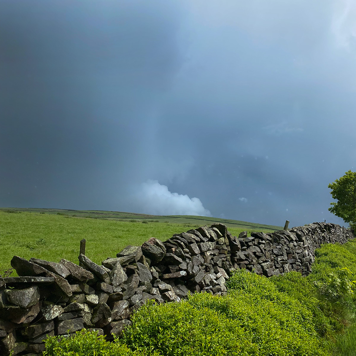 Oven Hill Cloudburst - Photo of dramatic clouds over Oven Hill in Birch Vale in the Peak District - photo by gavstretchy