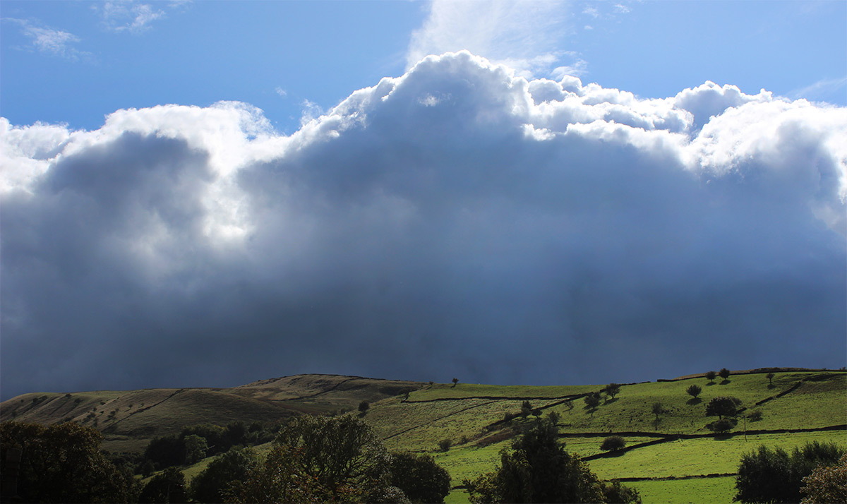 Phoside Moody Sky Landscape - Photo of a dramatic sky over Phoside in the Peak District in landscape format - photo by gavstretchy